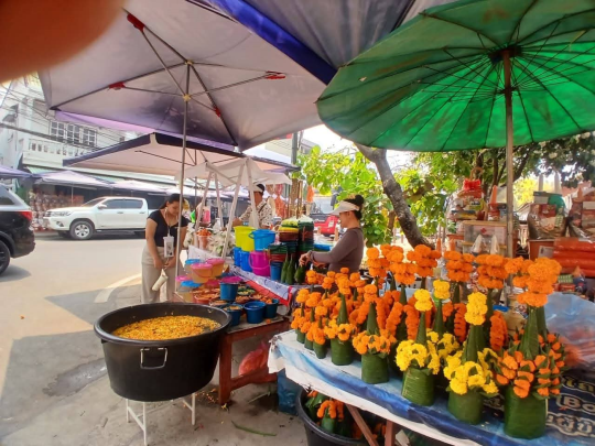 Vibrant Atmosphere for Offerings During Lao New Year